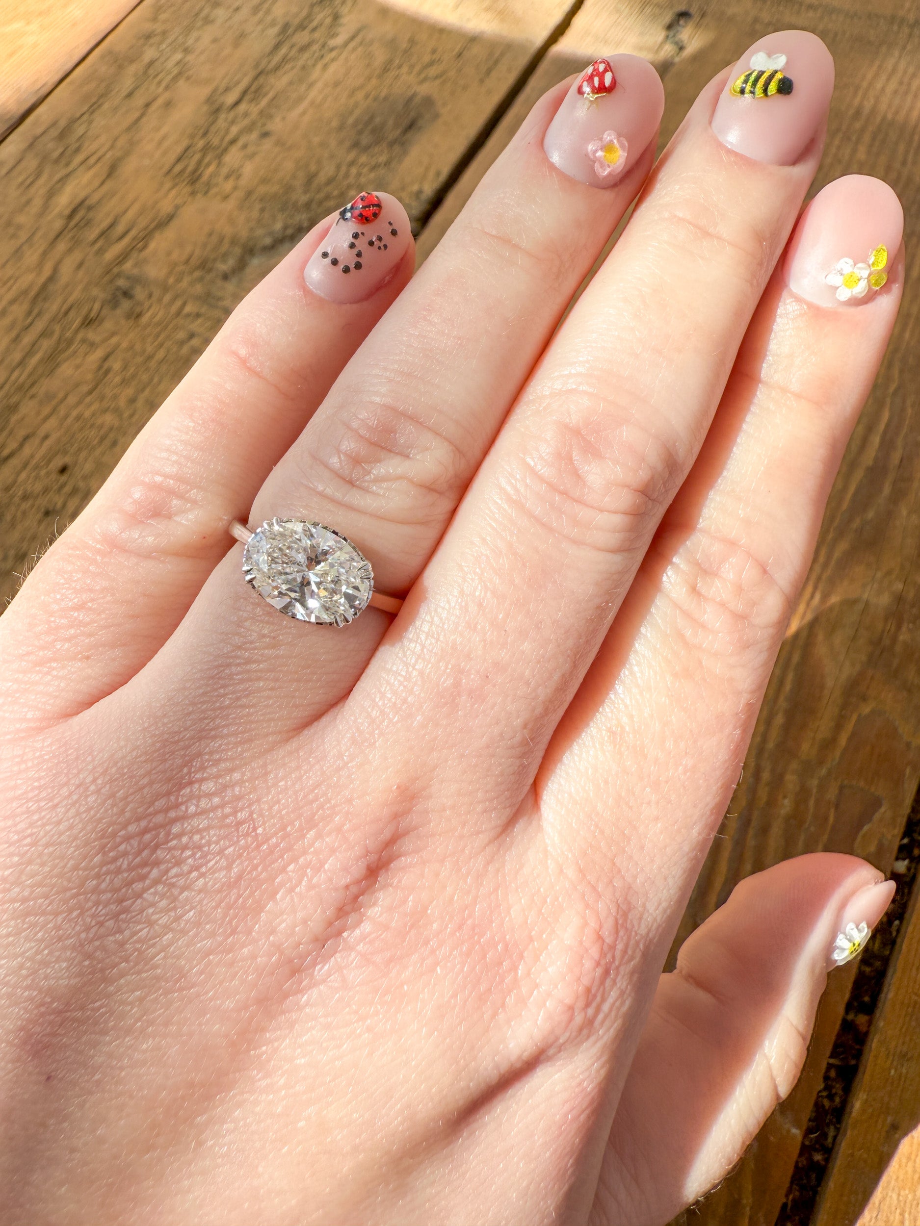 M & Co. East-West Oval Diamond Engagement Ring