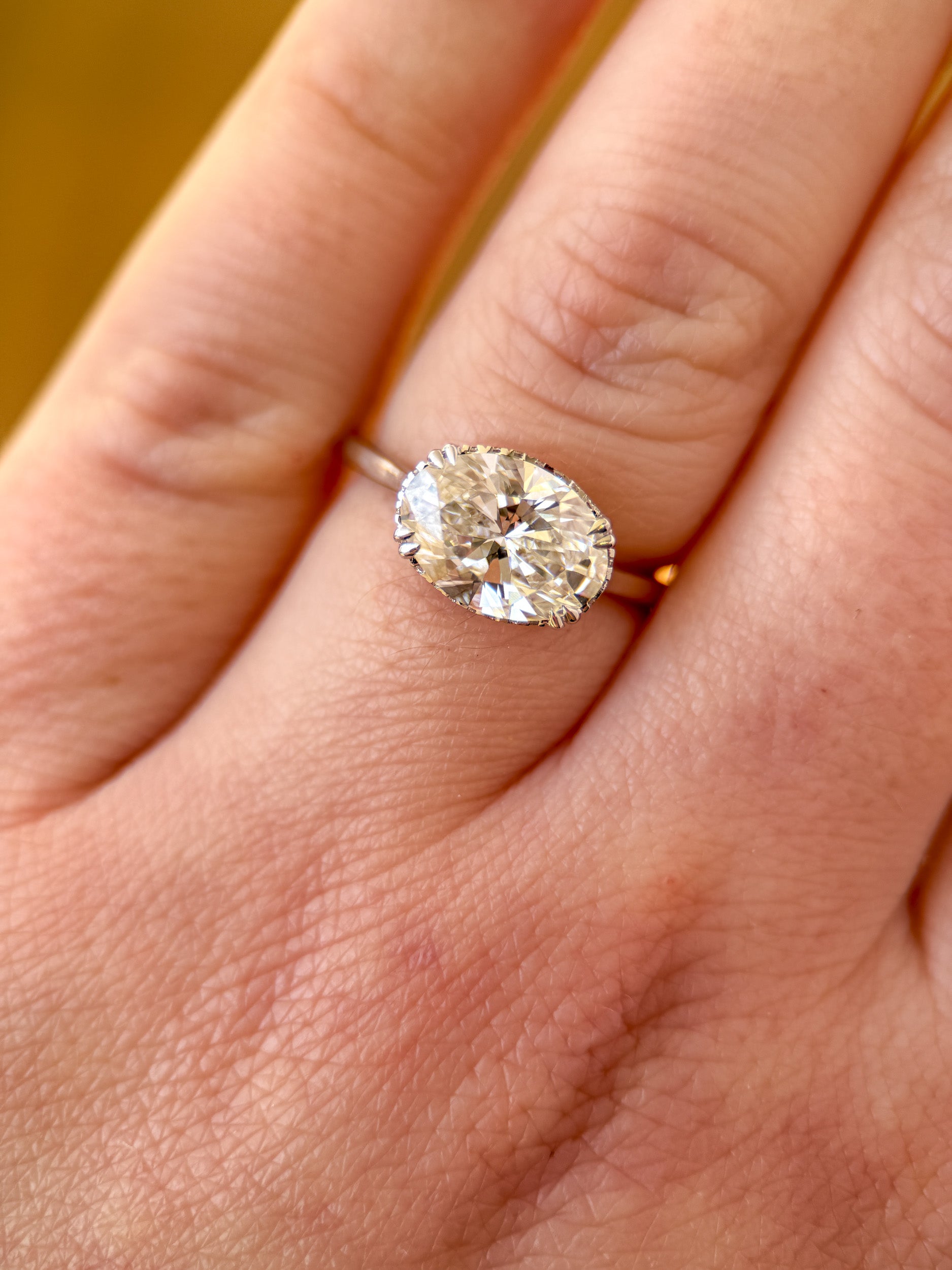 M & Co. East-West Oval Diamond Engagement Ring
